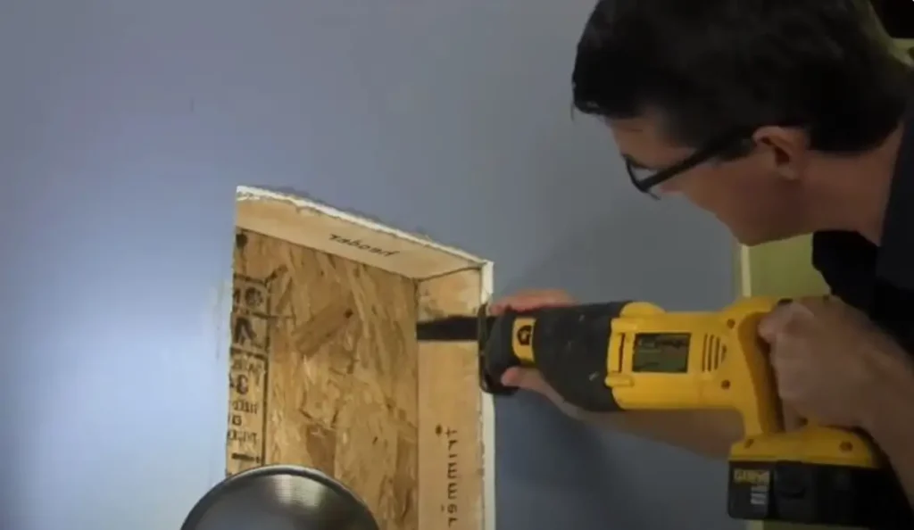 Vidcap showing cutting through exterior wall